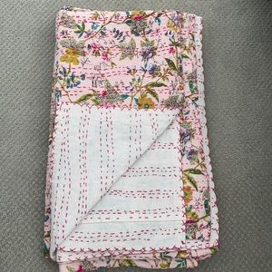 Pink floral kantha quilt